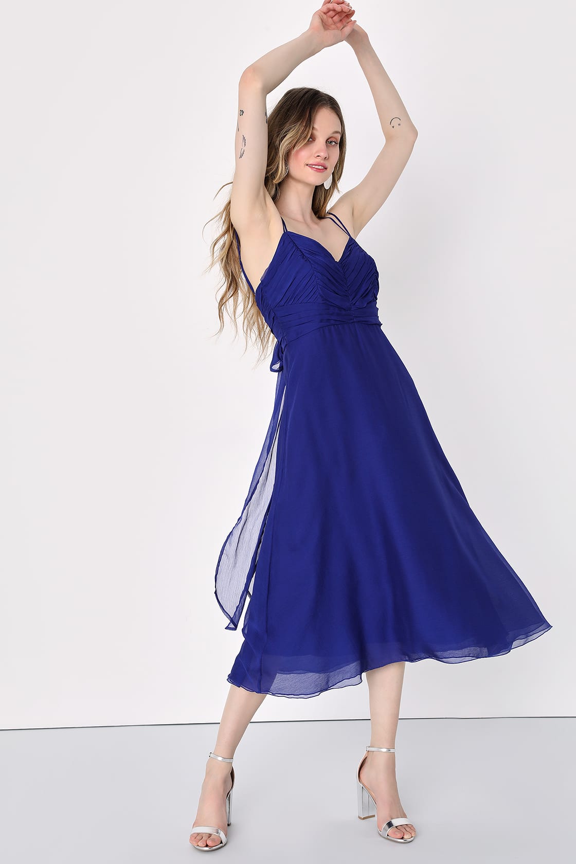 Side and front view of the Gorgeous Celebrations Navy Blue Pleated Chiffon Midi Dress by Lulus, sold at Harbour Thread