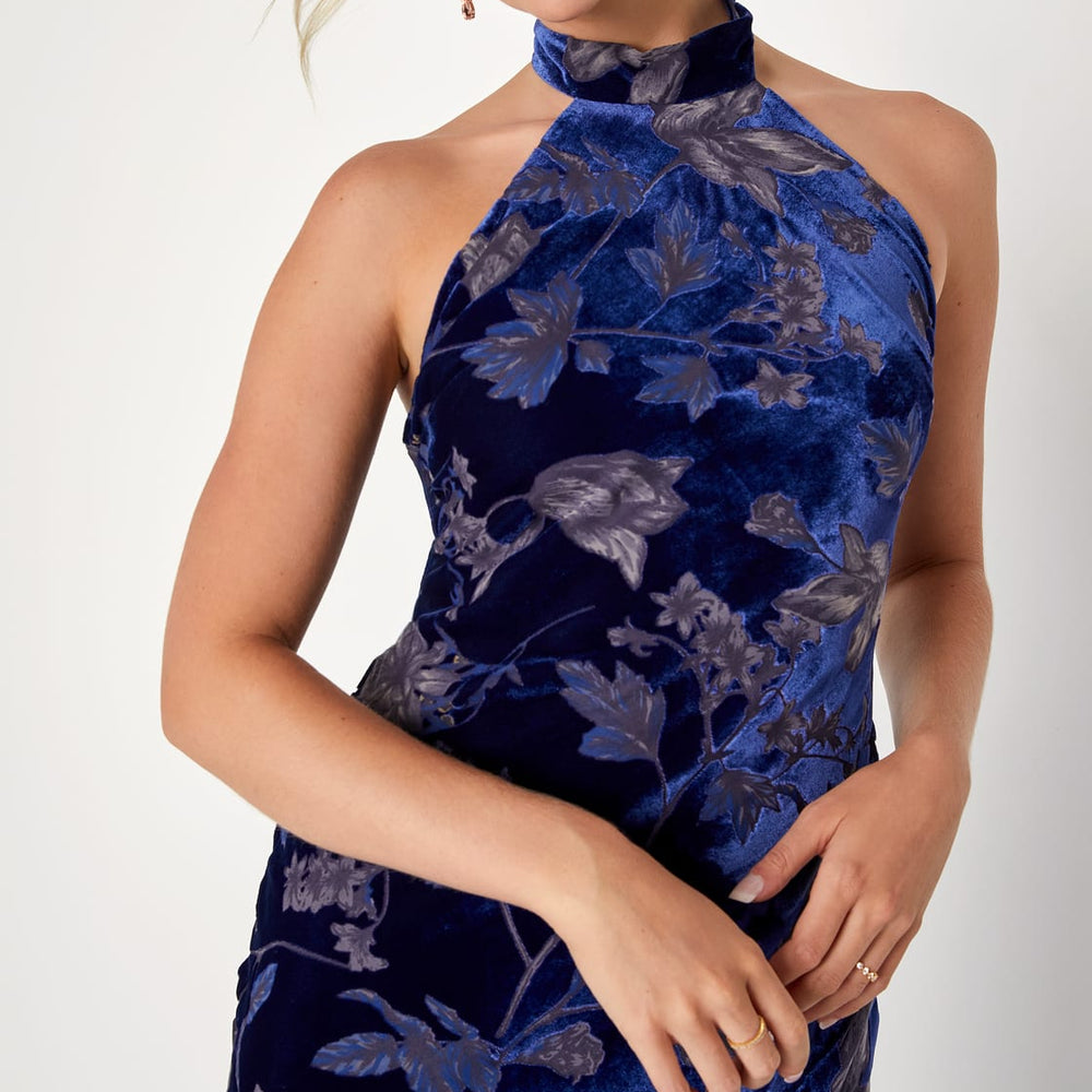 
                      
                        Front design detail on a Dark Blue Floral Burnout Velvet Halter Maxi Dress by Lulus
                      
                    