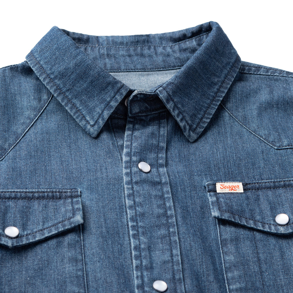 
                      
                        Collar and pearl snap detail on the denim chambray Reagan Pearl Snap Shirt
                      
                    