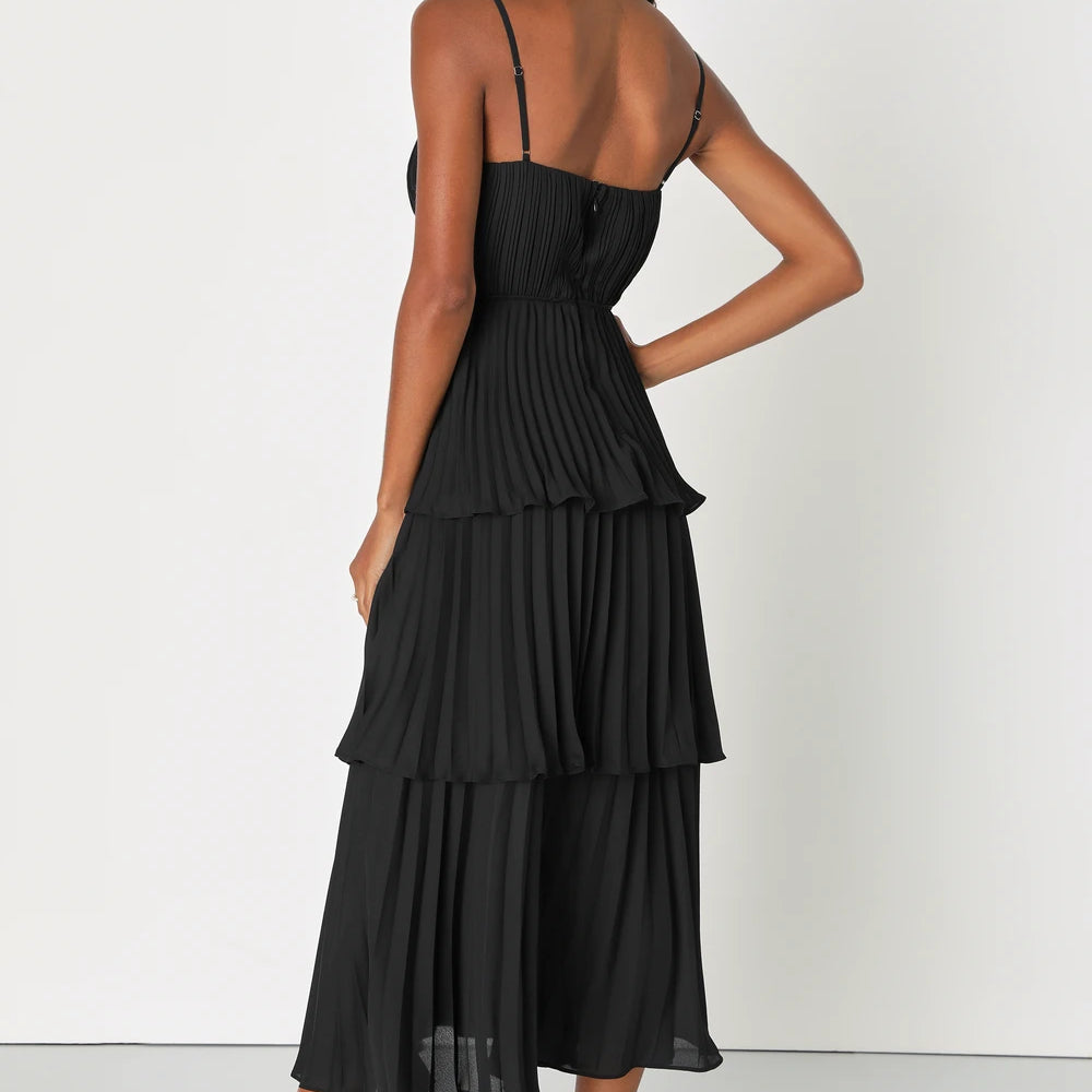 Back view of a woman wearing the Cascading Crush Black Tiered Bustier Midi Dress by Lulus