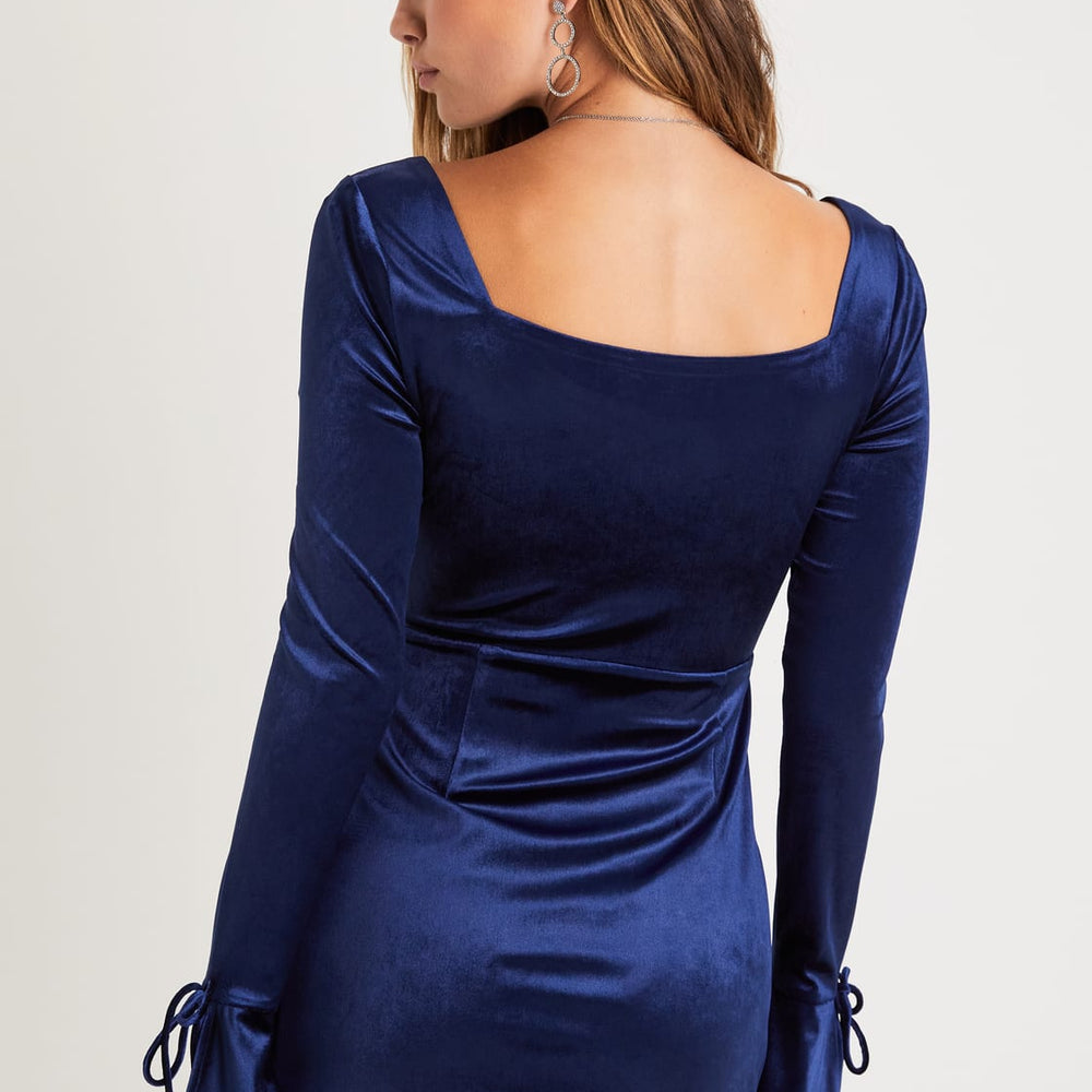 
                      
                        Back view of the Joyful Poise Navy Blue Velvet Long Sleeve Mini Dress by Lulus
                      
                    