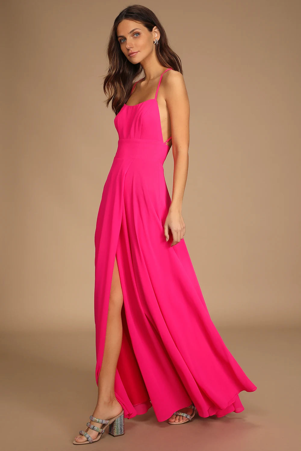 Side view of a woman wearing a Hot Pink Backless Maxi Dress by LuLu's