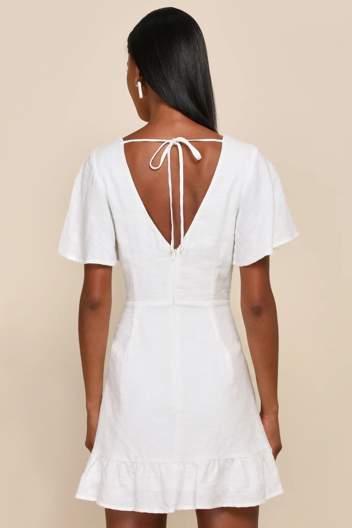 Back view of the Lulus Adorable Sensibility White Cutout Tie-Front Ruffled Mini Dress