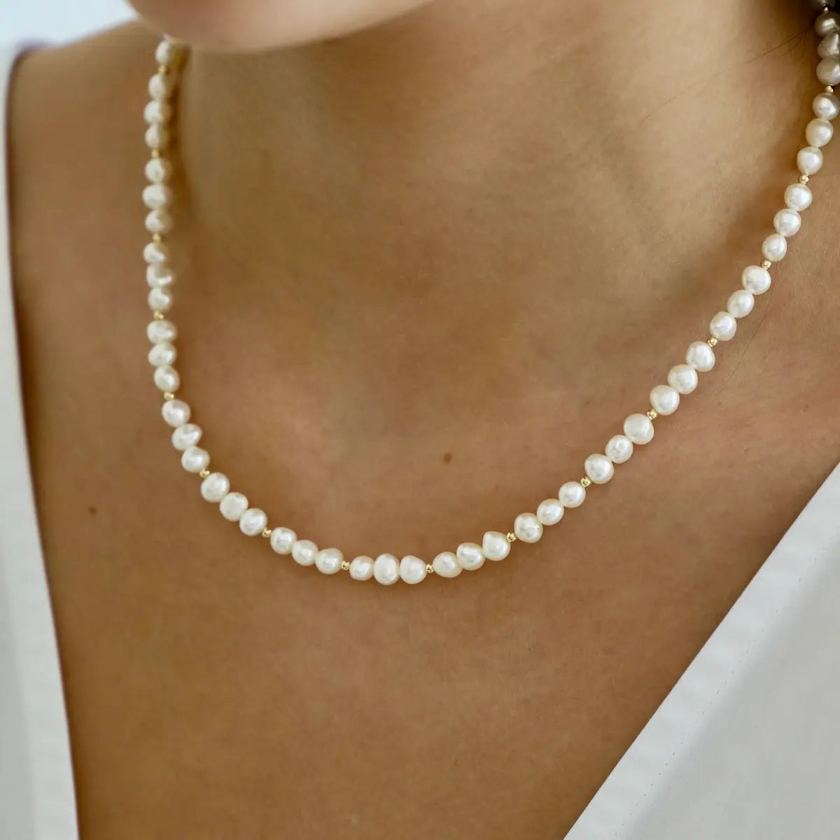 Shop the Kailani Necklace by Katie Waltman Jewelry at Harbour Thread Burlington for beachy elegance. 