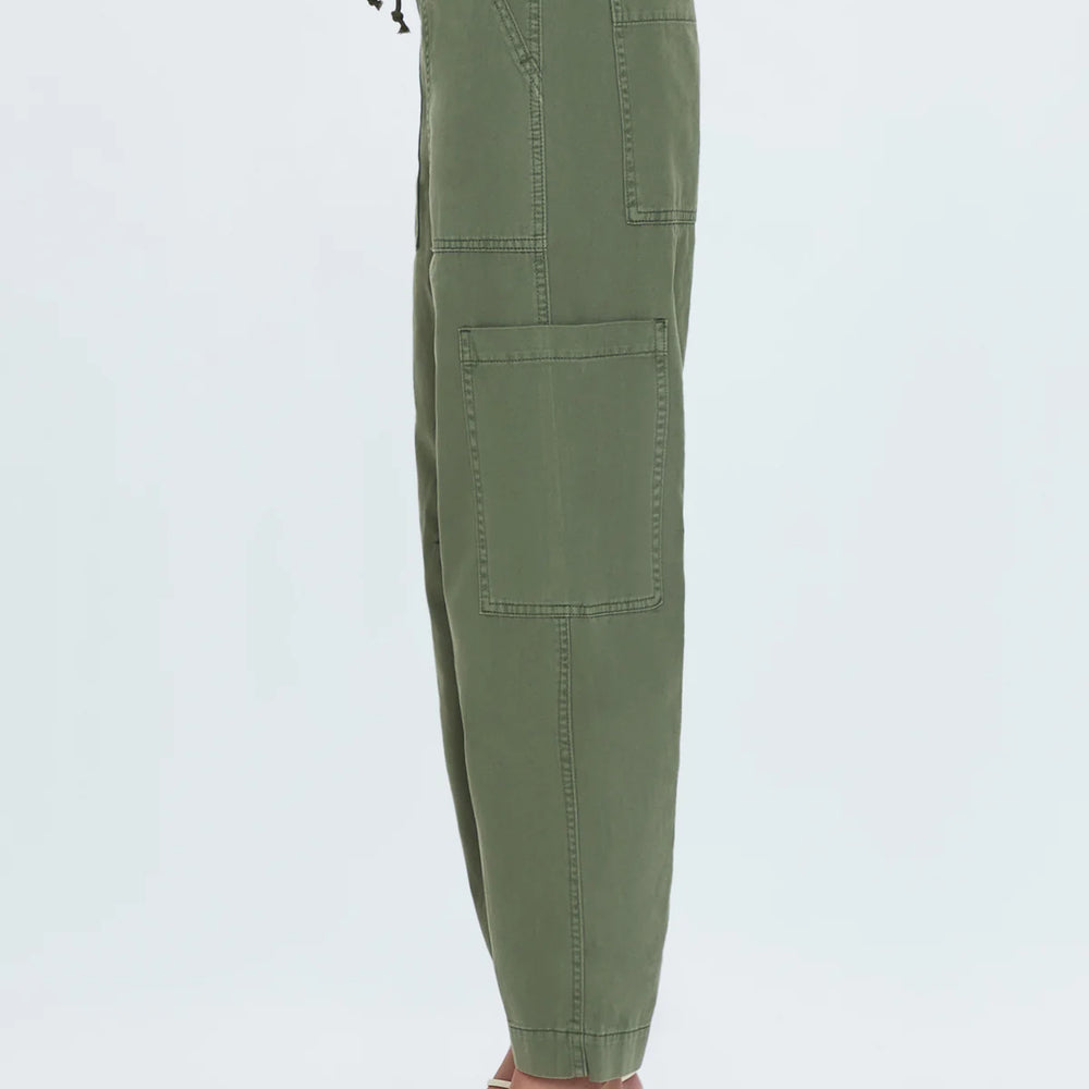 
                      
                        Green utility pants with drawstring waist
                      
                    
