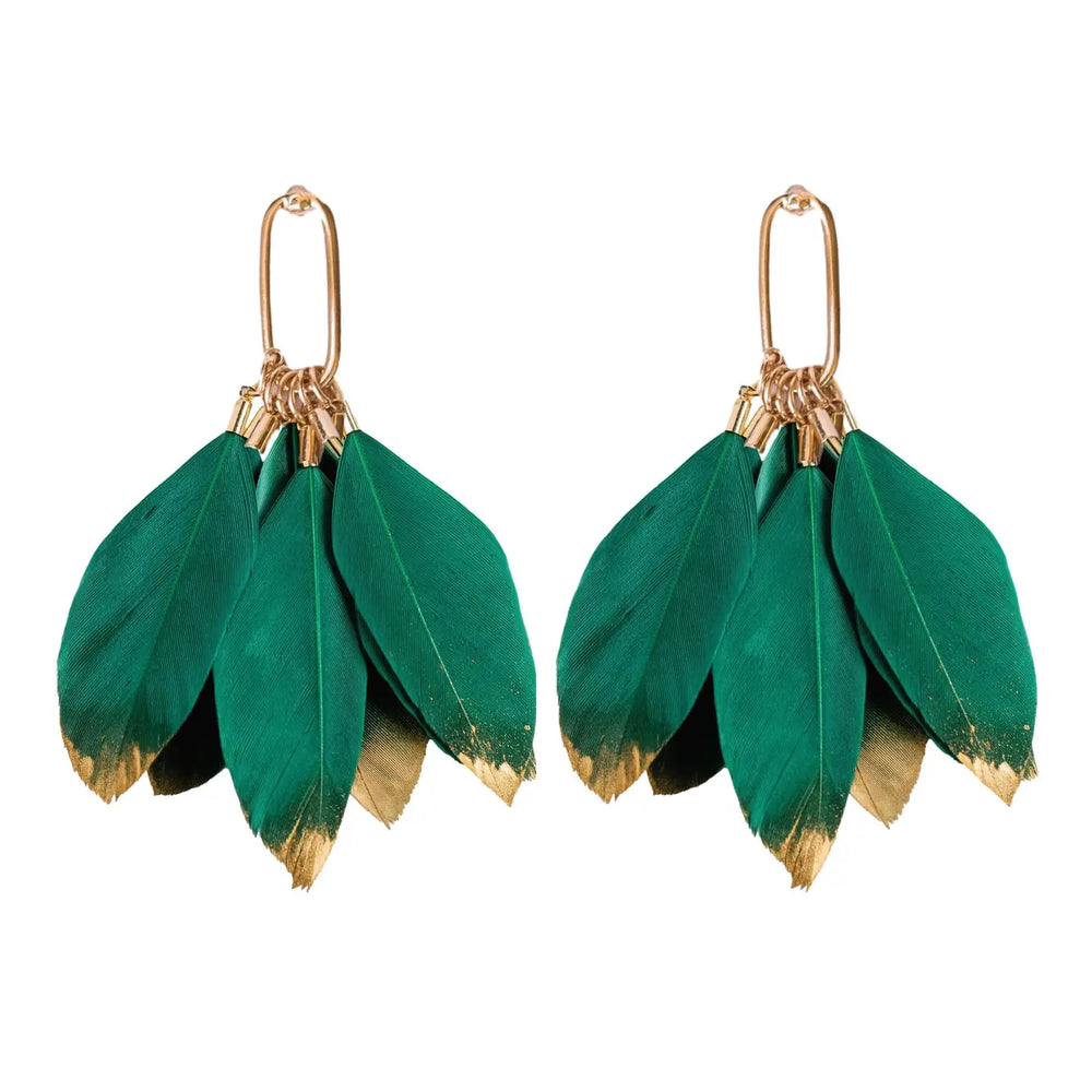 
                      
                        The Emerald Gold Dipped Feather Tassel Statement Earrings are available at Harbour Thread in Burlington, VT. 
                      
                    