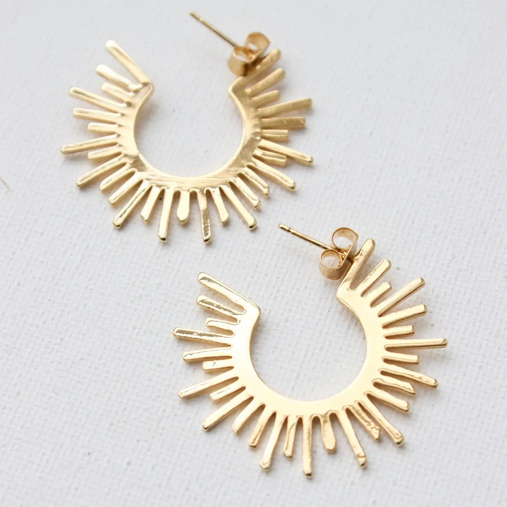 Shop the Mini Sun Silhouette Hoops by Katie Waltman Jewelry at Harbour Thread boutique in Burlington, VT. 