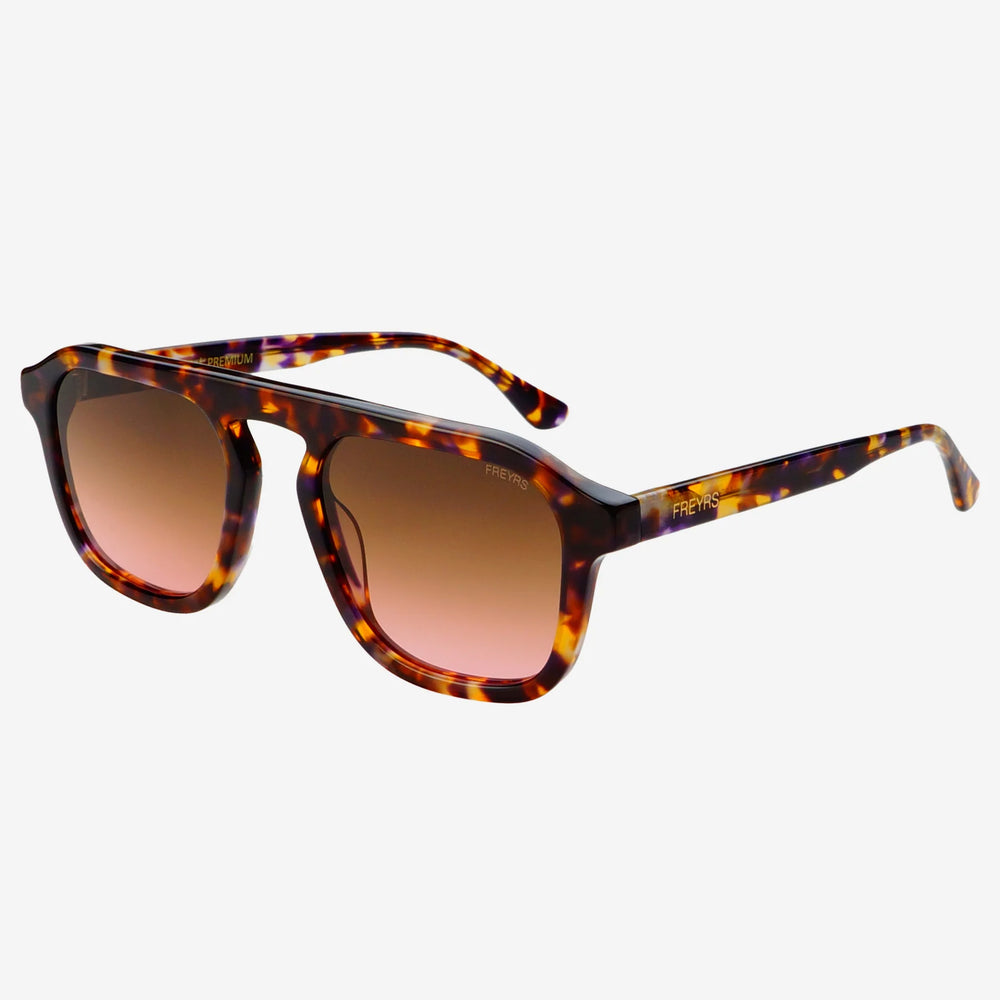 
                      
                        Sunglasses with tortoiseshell frame and brown lenses on a white background
                      
                    