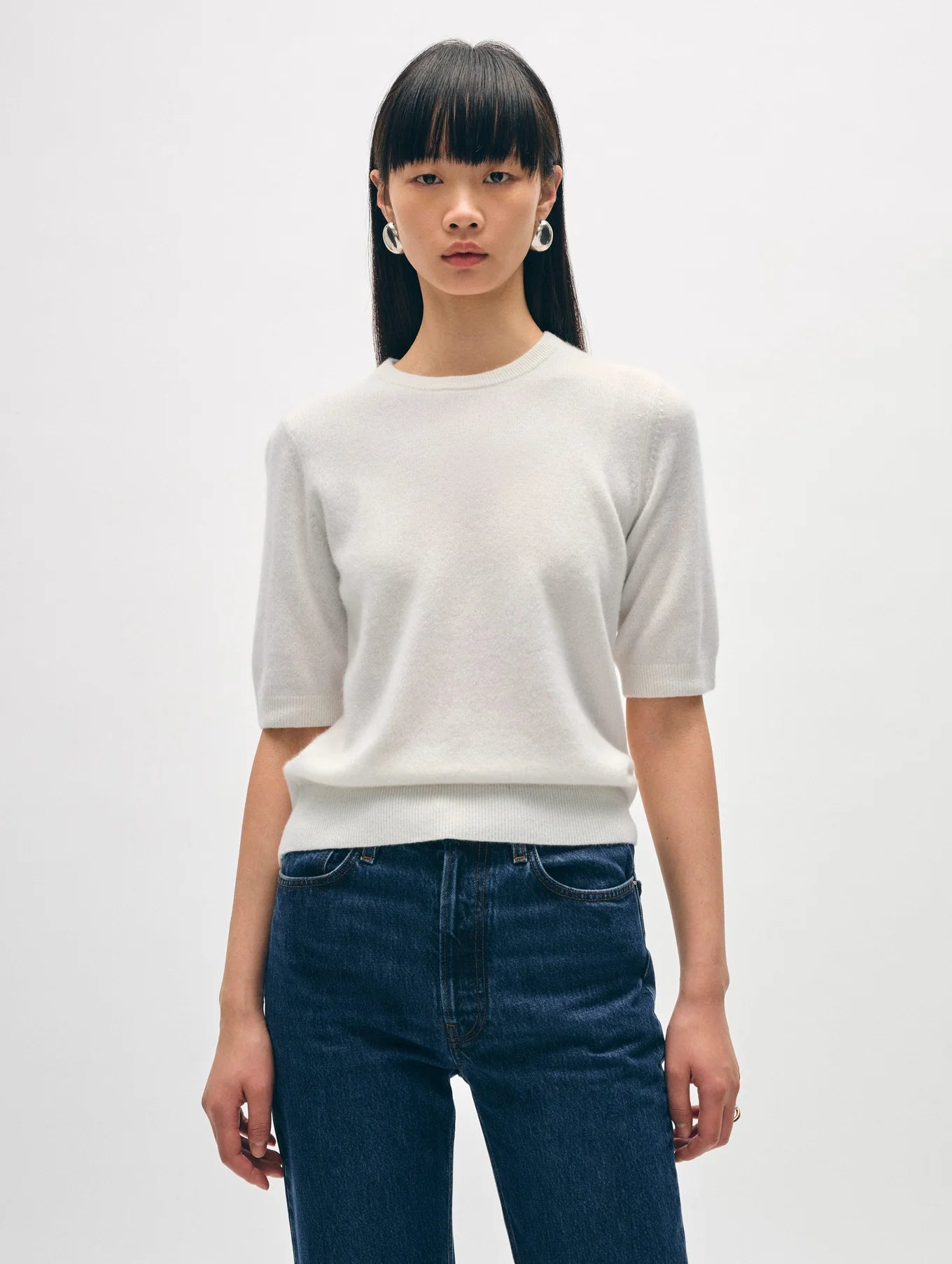 Front view of a woman wearing the Soft White Essential Cashmere Tee by White + Warren