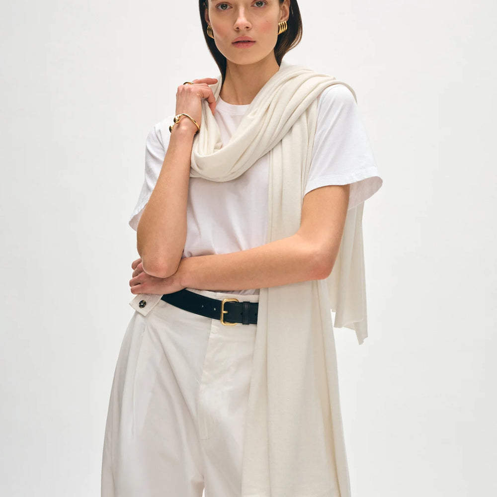 Woman wearing White + Warren's Silk Cashmere Travel Wrap in the color chalk