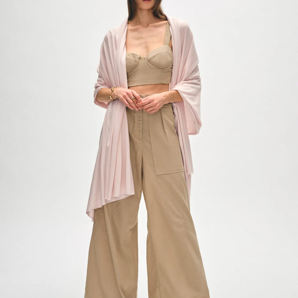 Woman wearing White + Warren's Silk Cashmere Travel Wrap in the color Light Rose