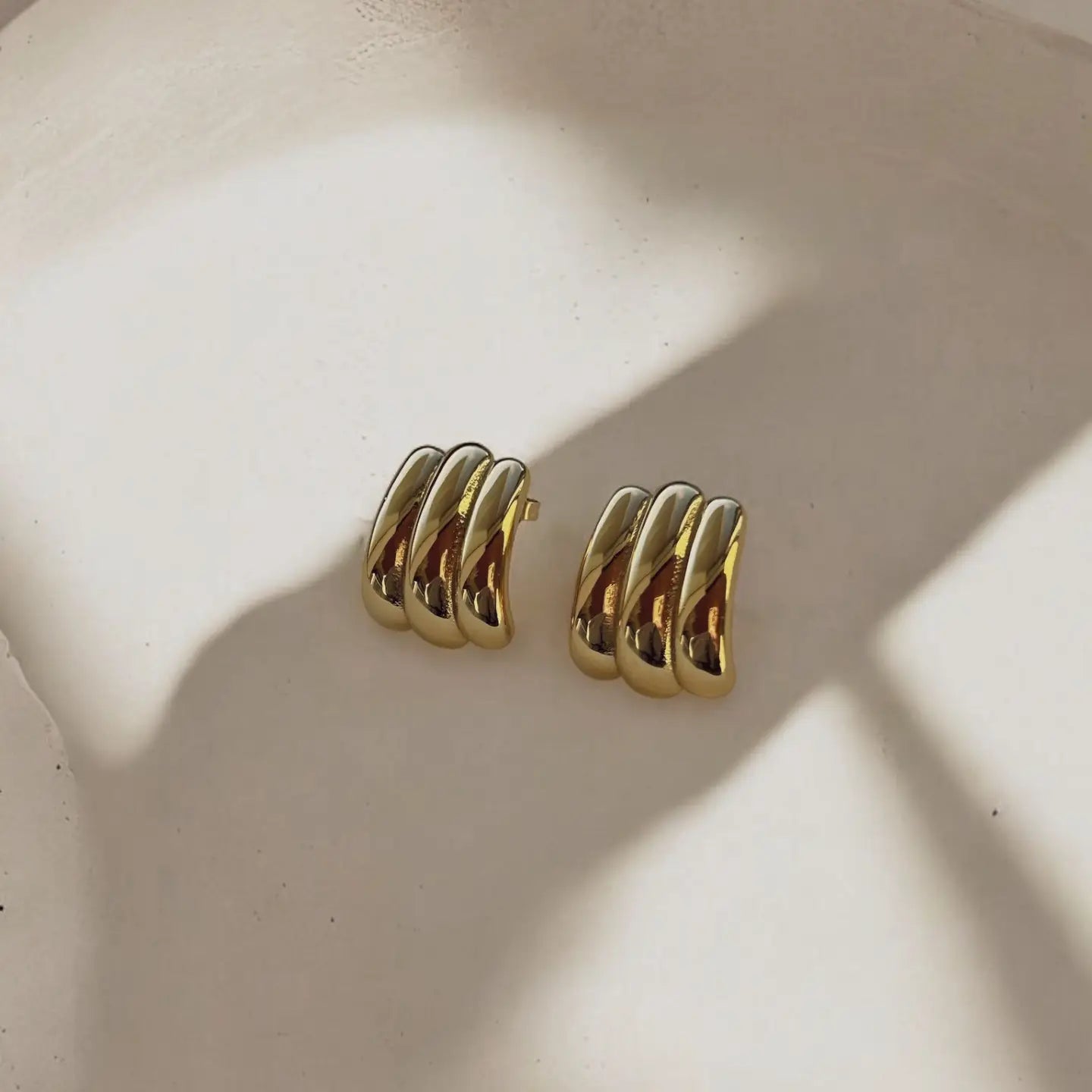 Shop the Simone Stud Earrings by Boem Collection at Harbour Thread boutique in St. Pete's Grand Central District. 