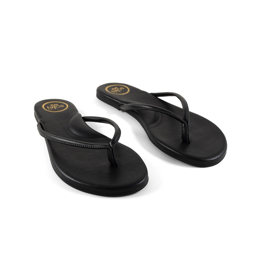 
                      
                        The Vivie Black Thong Sandals by Solei Sea
                      
                    