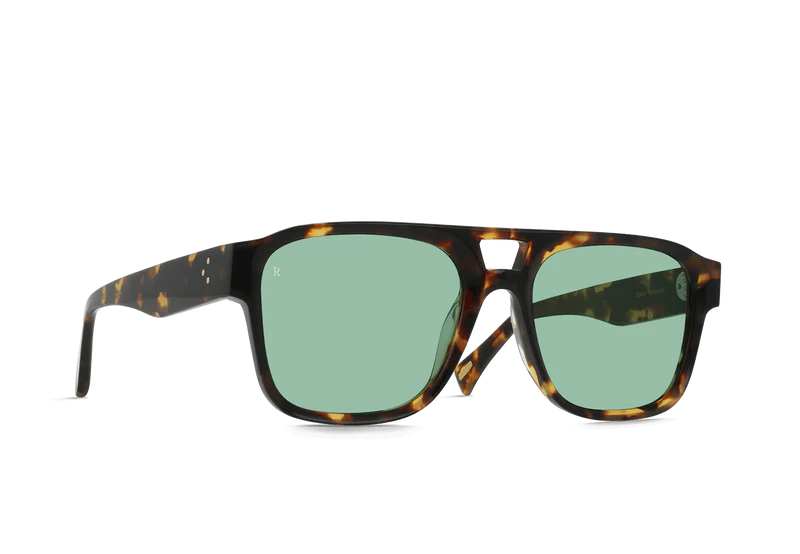 
                      
                        Modern navigator sunglasses with green tinted lenses
                      
                    