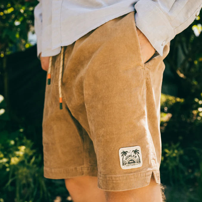 
                      
                        Side view of the tan Pressure Drop Cord Shorts by Howler Bros
                      
                    