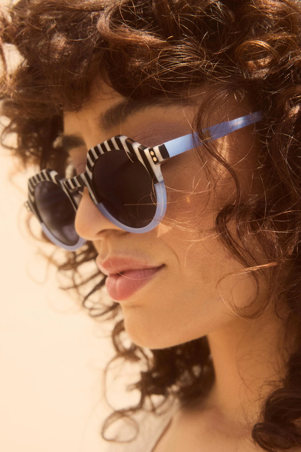 Make a chic summer statement with the Georgie Rounded Sunglasses by SARDINE, now at Harbour Thread women's boutique in St. Petersburg, FL. 