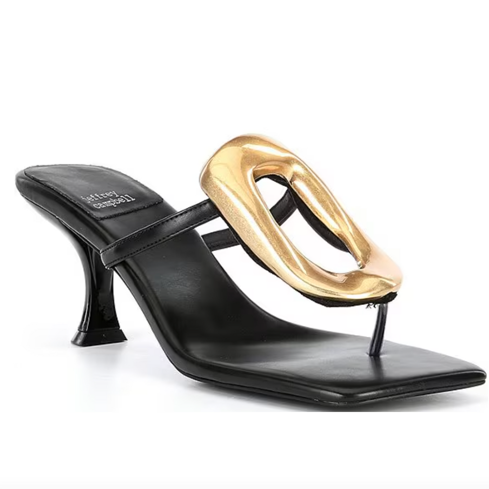 Shop the black and gold Linq Heeled Thong Sandals by Jeffrey Campbell at Harbour Thread. 