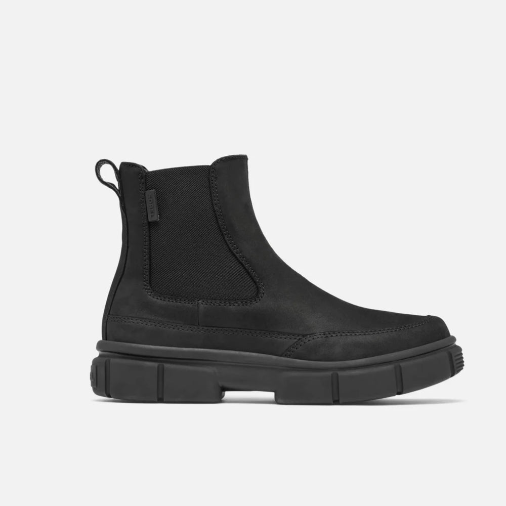 Side view of the Black Explorer STRT Women's Chelsea Boot by Sorel