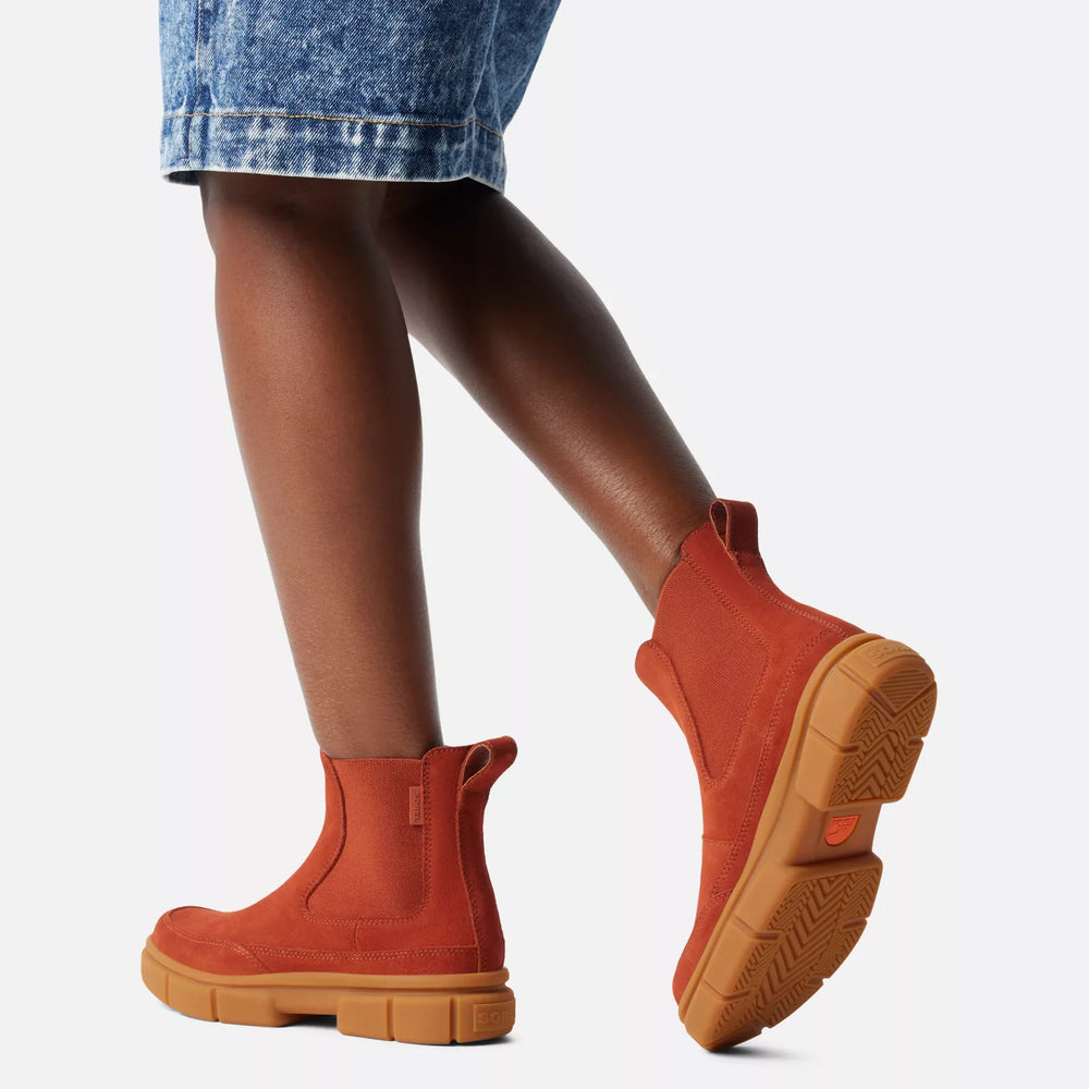 
                      
                        A woman wearing the Sanguine Explorer STRT Women's Chelsea Boot by Sorel
                      
                    