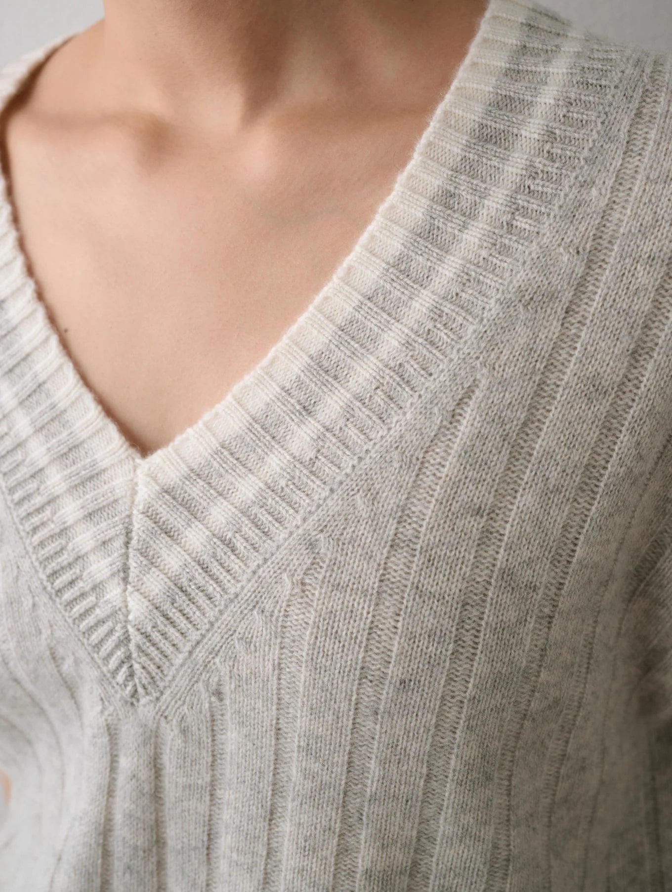 Front neckline detail view of the White + Warren Cashmere Varsity Ribbed V-Neck Sweater in the colors Misty Grey Heather and White