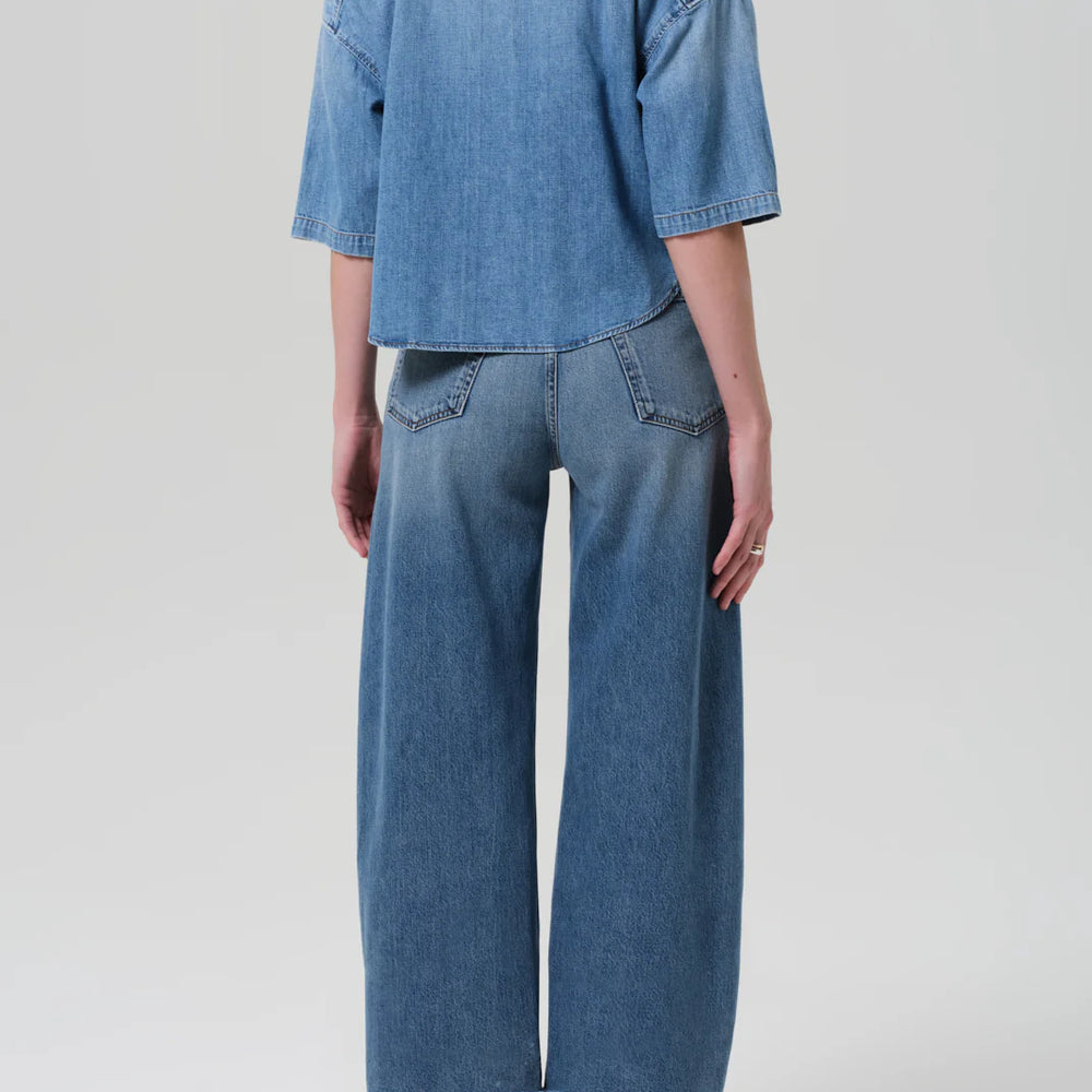 
                      
                        Medium wash raw hem jeans
                      
                    