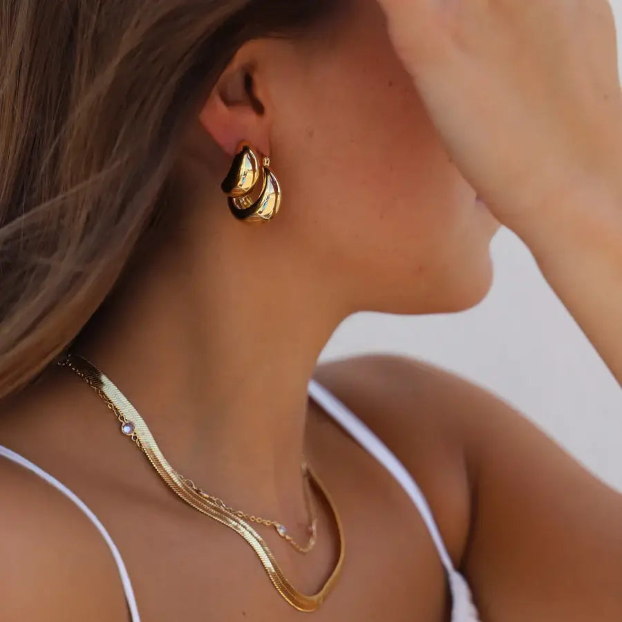 
                      
                        Perfect for any occasions, shop the gold plated Bonnie Chunky Teardrop Stud Earrings from Katie Waltman Jewelry at Harbour Thread. 
                      
                    