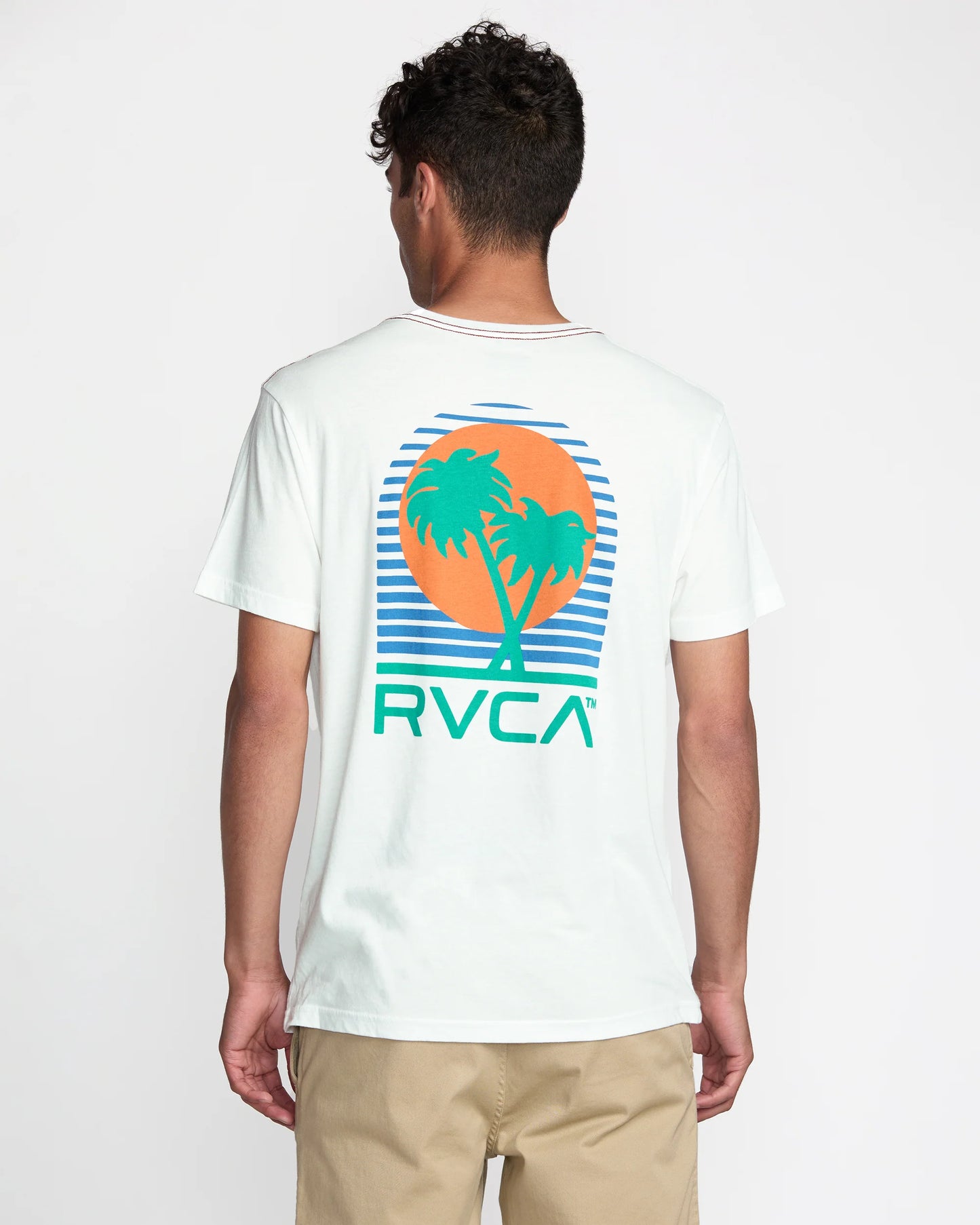 The Puerto Nuevo Short Sleeve Tee features a retro style custom RVCA palm tree graphic