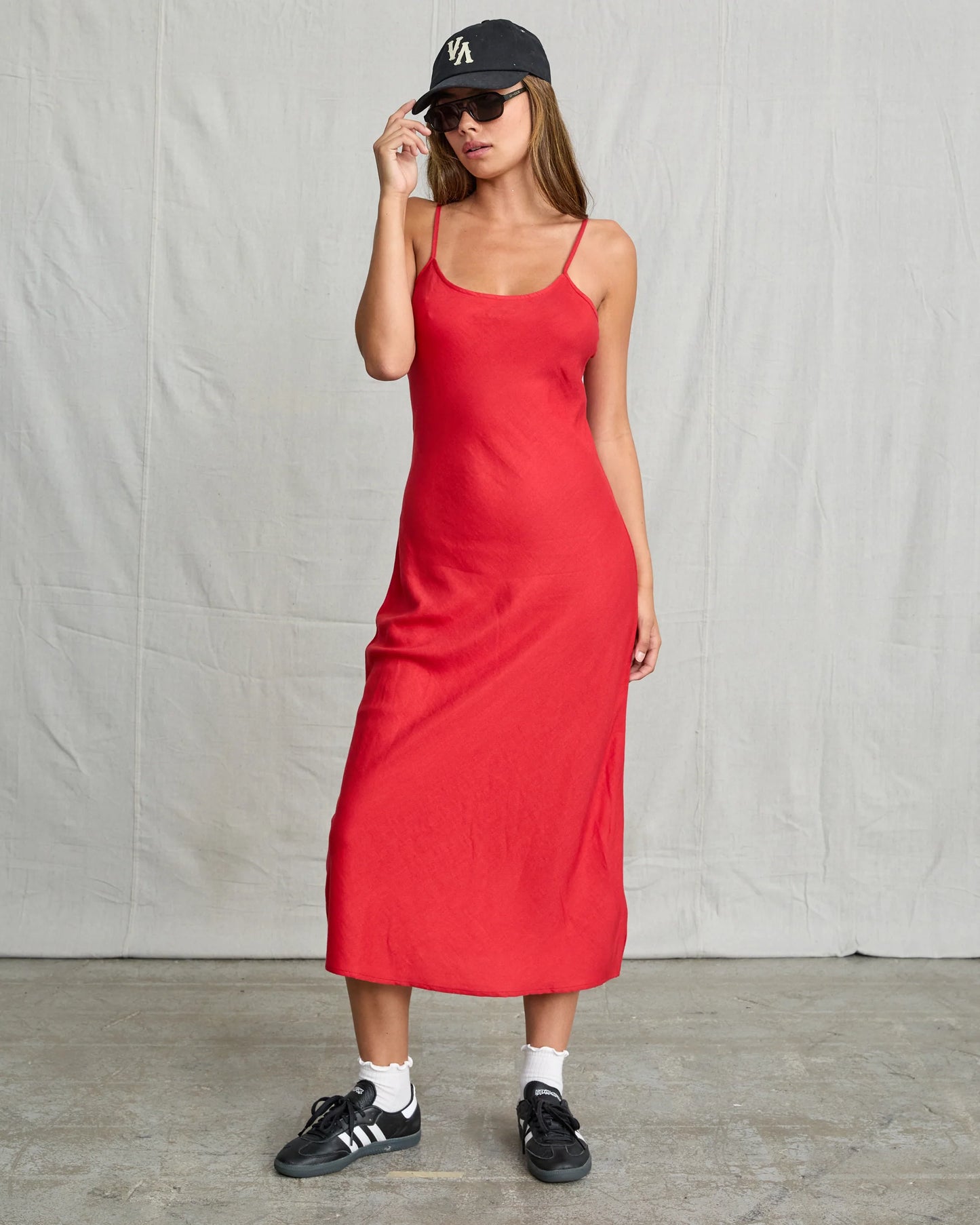 Enjoy endless ways to style the red hot RVCA Lets Dance Midi Slip Dress. Shop yours at Harbour Thread women's boutique in Burlington, VT!