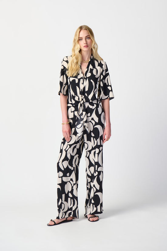 Front, full outfit view of the Joseph Ribkoff Abstract Print Woven Wide-Leg Pants in the colors Black and Moonstone