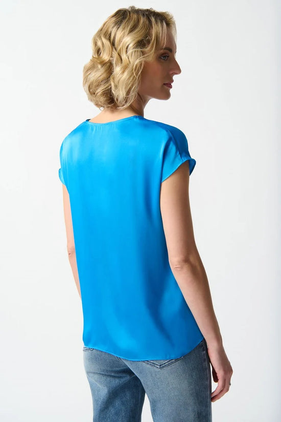 Back view of the Joseph Ribkoff Satin Short Sleeve Top in the color French Blue