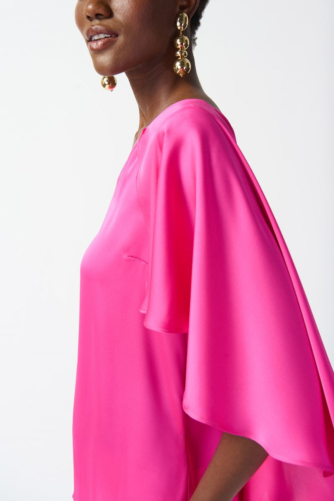 
                      
                        Side view of the Ultra Pink Satin Cape Top by Joseph Ribkoff
                      
                    