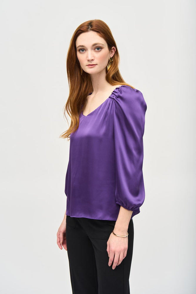 
                      
                        The Mystic Satin Straight Top With Puff Sleeves by Joseph Ribkoff
                      
                    