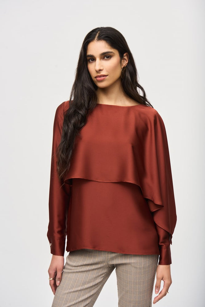 
                      
                        The Cinnamon Satin Flared Cape Top by Joseph Ribkoff
                      
                    