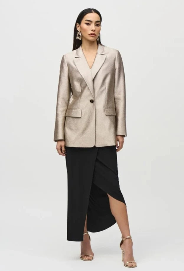 Woman wearing the Black Silky Knit Asymmetrical Pull-on Skirt by Joseph Ribkoff paired with an oversized blazer