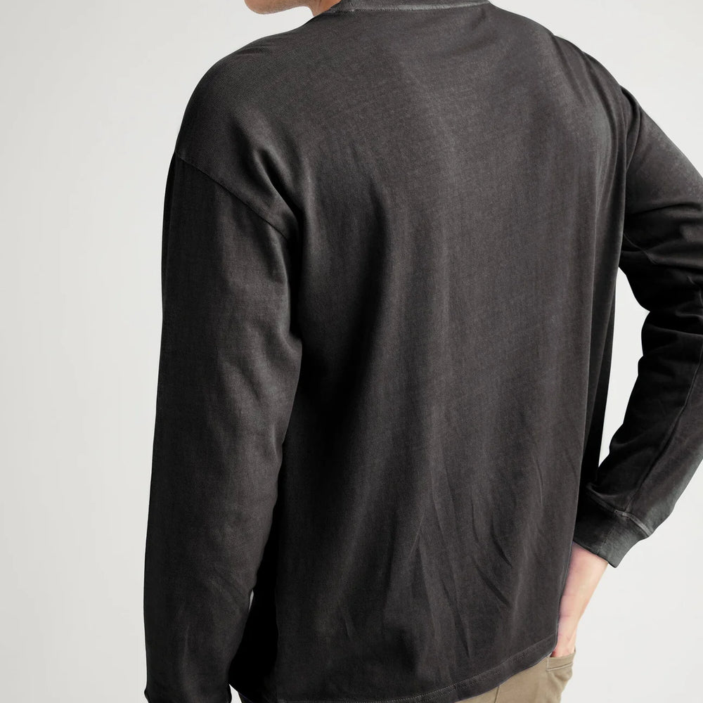 
                      
                        Back view of the men's black long sleeve tee by Richer Poorer
                      
                    