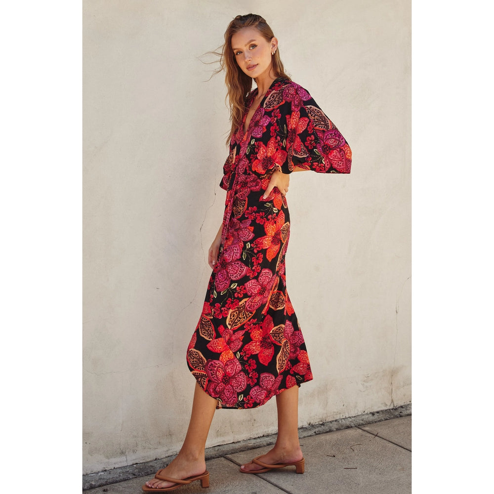 
                      
                        Women's tropical floral dress with elbow length sleeves and v-neckline
                      
                    
