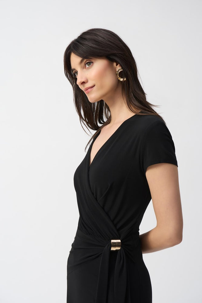 
                      
                        The Silky Knit Flowy Wrap Dress features a wrap neckline that starts at the waist and cap sleeps
                      
                    