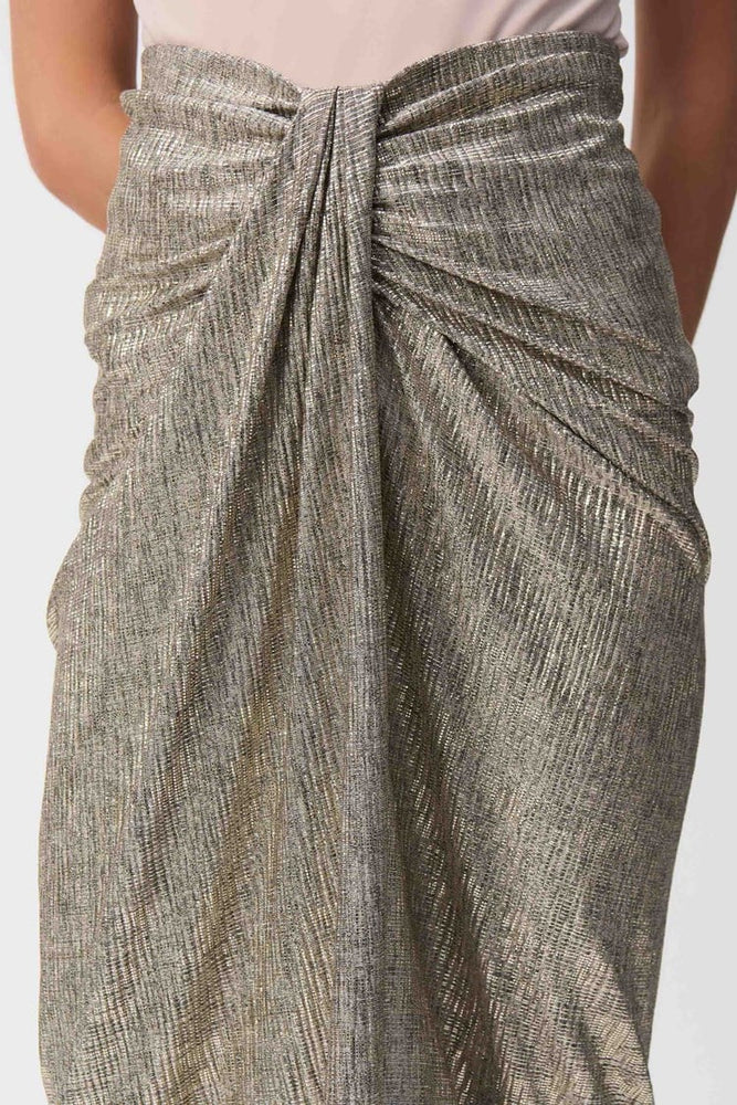 
                      
                        This Draped Pencil Skirt from Joseph Ribkoff is crafted from a foiled melange knit
                      
                    