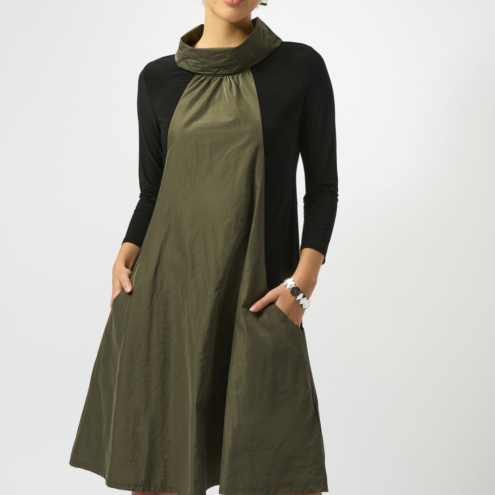 A unique design compliments a classic A-line fit on the Joseph Ribkoff Silky Knit & Memory Colour Block Dress. Shop yours at Harbour Thread in Burlington, VT!