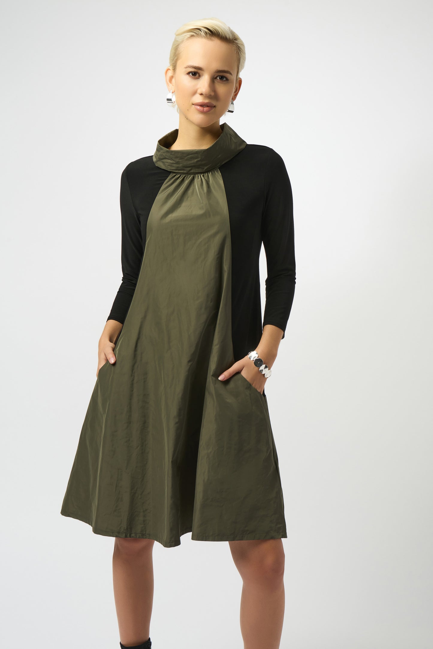 A unique design compliments a classic A-line fit on the Joseph Ribkoff Silky Knit & Memory Colour Block Dress. Shop yours at Harbour Thread in Burlington, VT!