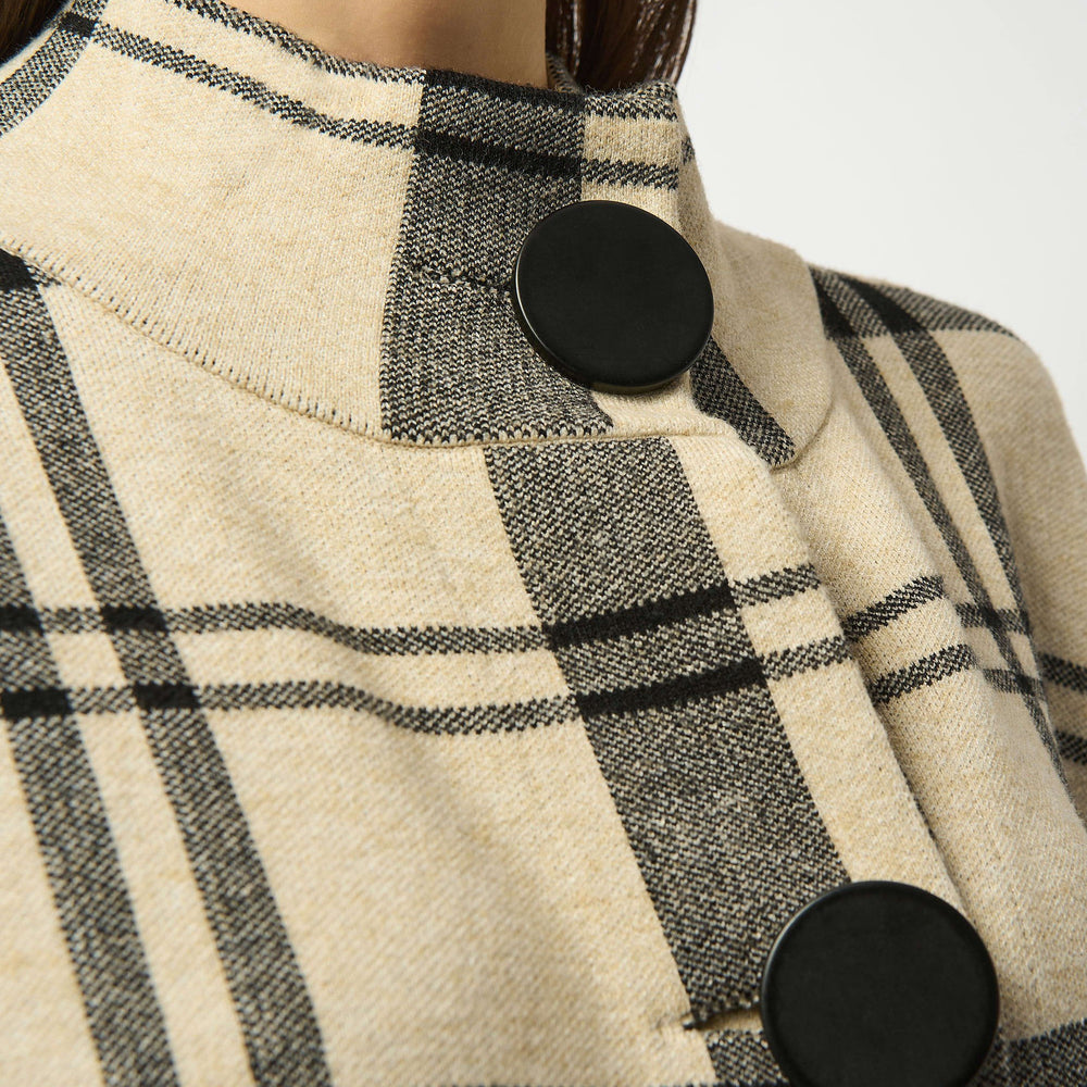 Women's plaid poncho with oversized buttons