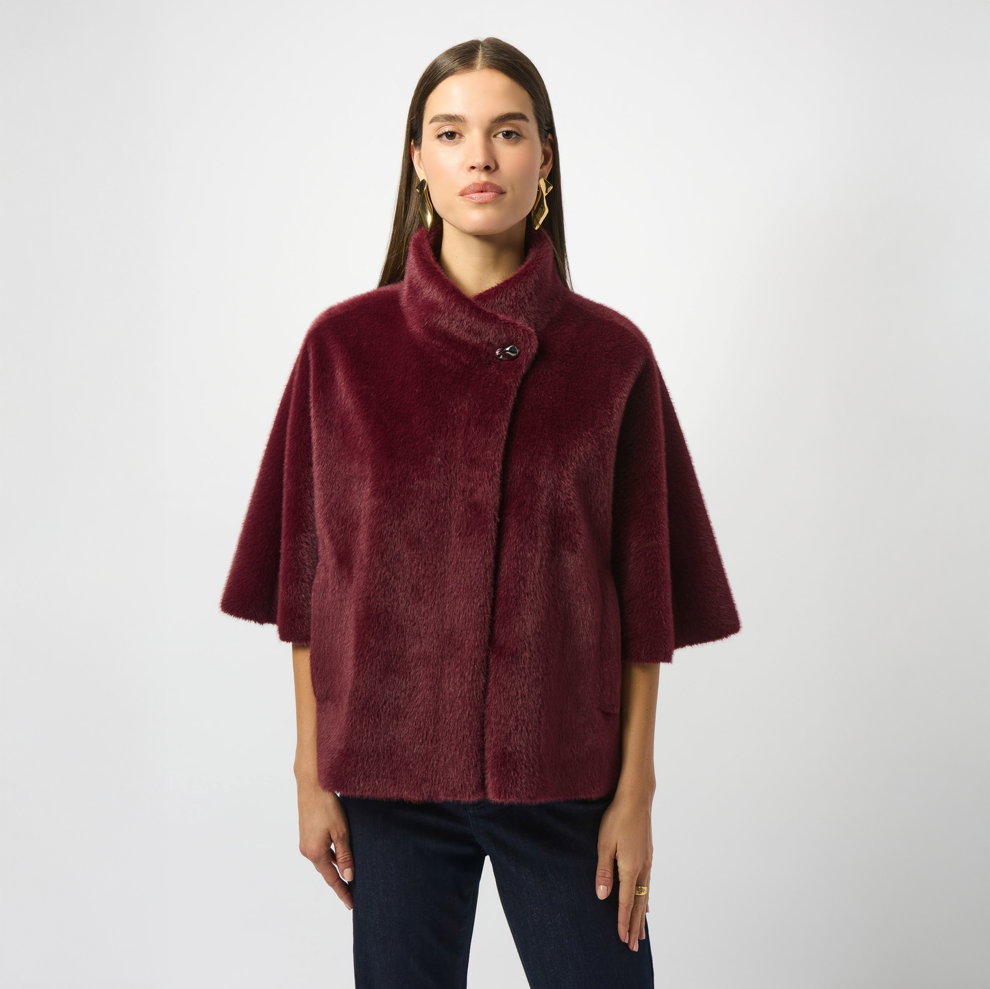 Woman wearing the Joseph Ribkoff Bonded Faux Fur Suede Jacket in the color Merlot