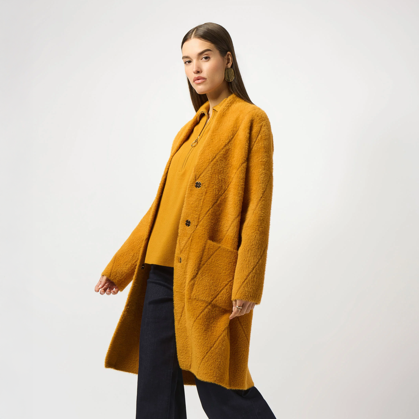 Woman wearing The Joseph Ribkoff Feather Yarn Sweater Knit Coat in the color Medallion