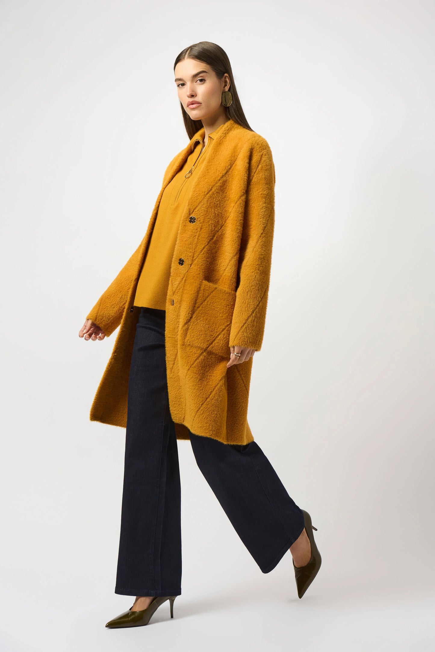 The Joseph Ribkoff Feather Yarn Sweater Knit Coat is available at Harbour Thread boutique in the color Medallion