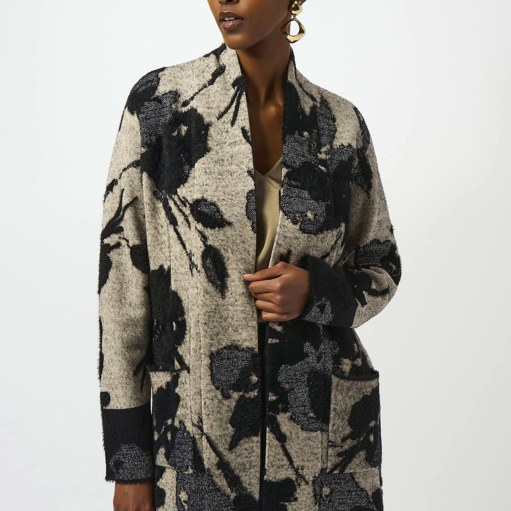 The Joseph Ribkoff Abstract Jacquard Sweater Knit Long Cardigan is available at Harbour Thread boutique in Burlington, VT