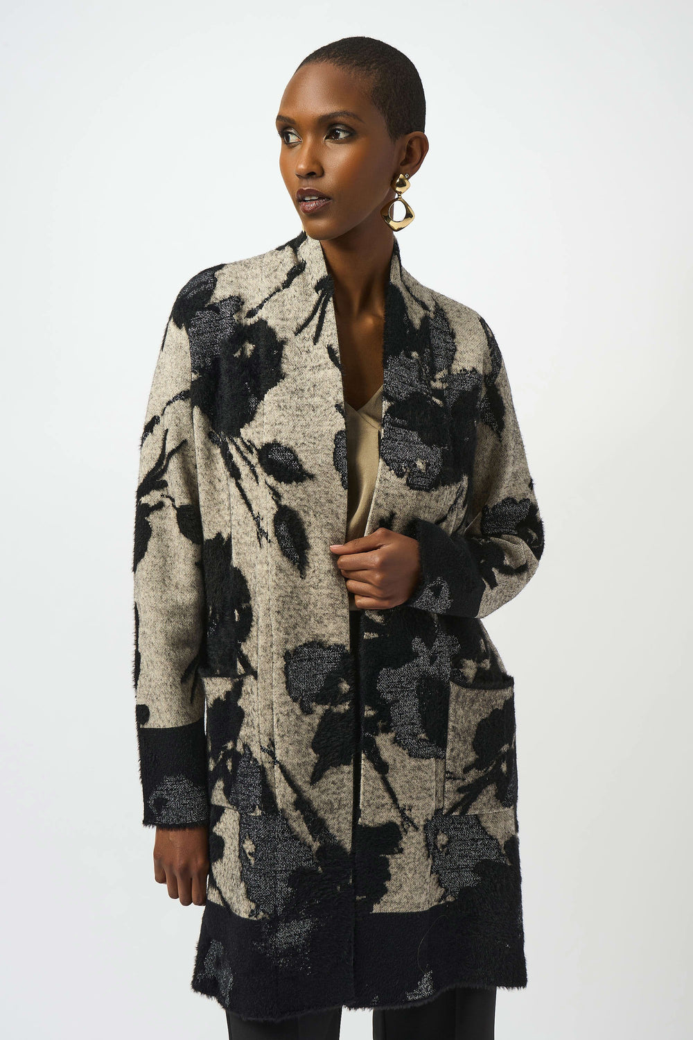 The Joseph Ribkoff Abstract Jacquard Sweater Knit Long Cardigan is available at Harbour Thread boutique in Burlington, VT