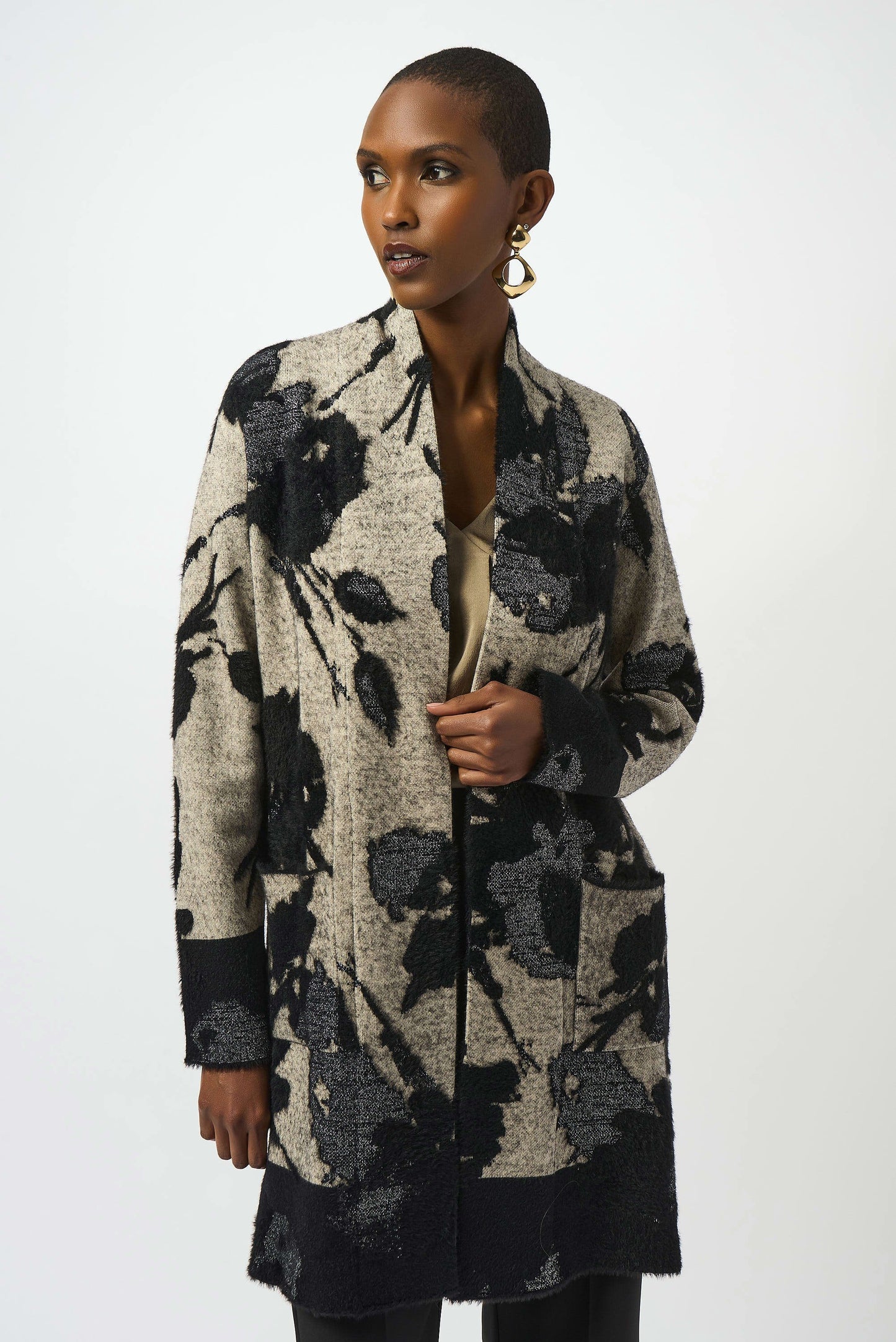 The Joseph Ribkoff Abstract Jacquard Sweater Knit Long Cardigan is available at Harbour Thread boutique in Burlington, VT