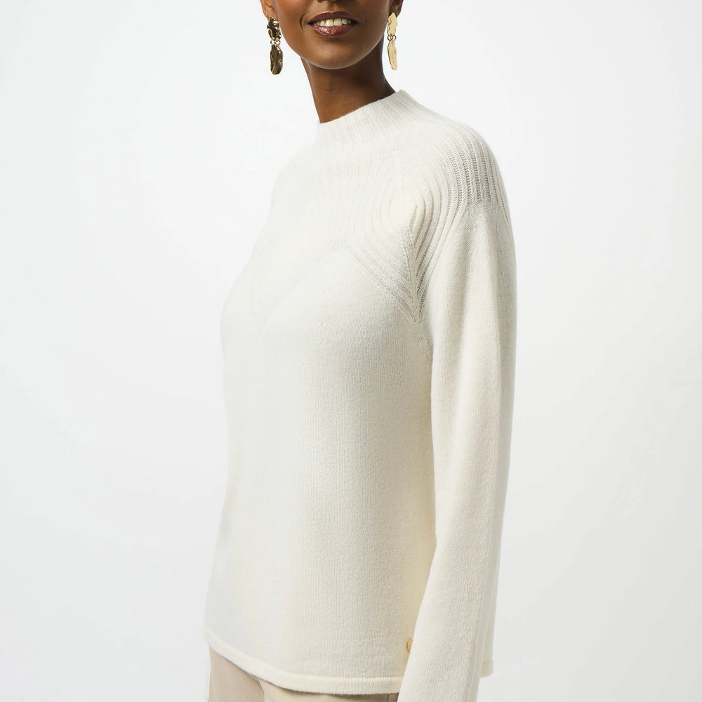 This warm and luxurious wool sweater from Joseph Ribkoff is a must have for elevated cold weather outfits. Find it now at Harbour Thread in Burlington, VT.