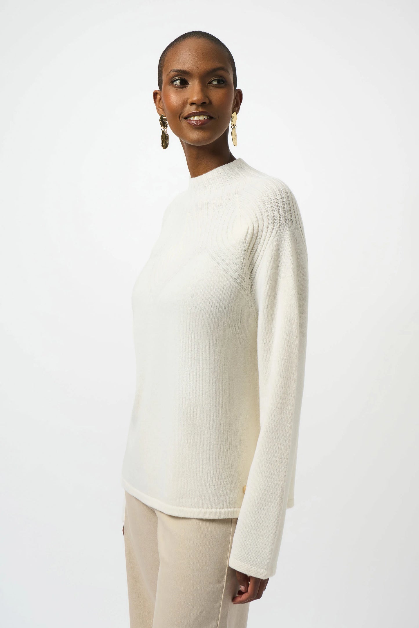 This warm and luxurious wool sweater from Joseph Ribkoff is a must have for elevated cold weather outfits. Find it now at Harbour Thread in Burlington, VT.