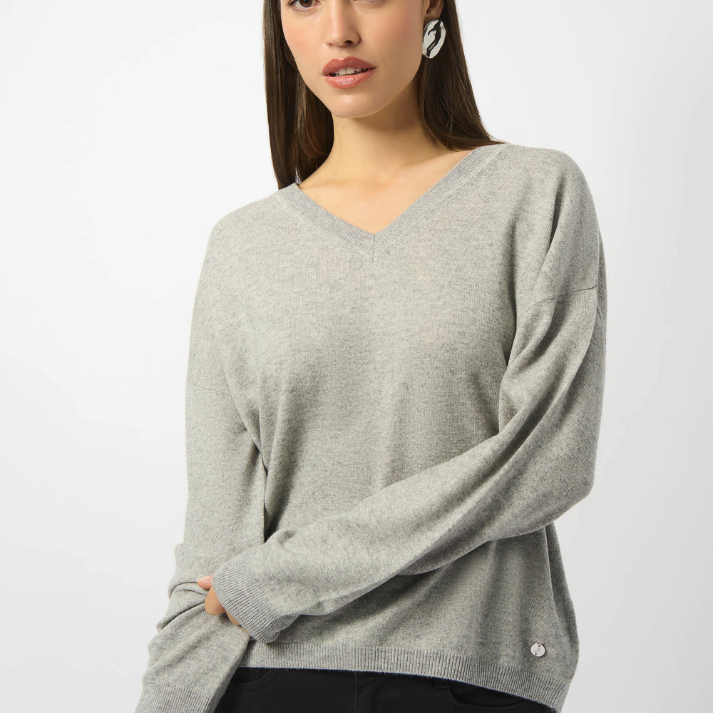 This versatile v-neck sweater from Joseph Ribkoff perfectly blends into any casual or workwear ensemble. Find it now at Harbour Thread in Burlington, VT!